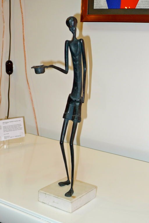 tall skinny sculptures