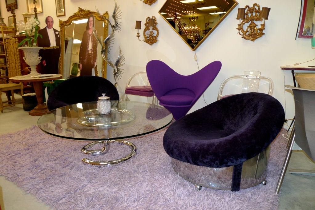 American Pair of 1970's  Polished Steel Tub Chairs on Casters