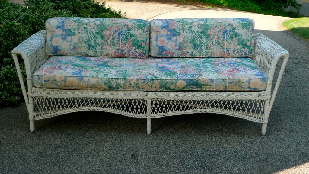 Uncommon form and versatile Art Deco wicker daybed with mattress in heavy density foam and double wedge cushions and original coil springs.  <br />
<br />
Double sided so can float or be used against a wall as a sofa.