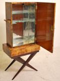 PRICE DISCOUNTED FROM $9,500 FOR 1STDIBS SATURDAY SALE – ONE WEEK ONLY. NO ADDITIONAL DISCOUNTS, NO HOLDS. ITEM WILL BE RETURNED TO REGULAR PRICING AFTER 7 DAYS. Visa/Mastercard only.

Singular Aldo Tura cocktail bar cabinet in trompe l'oeil