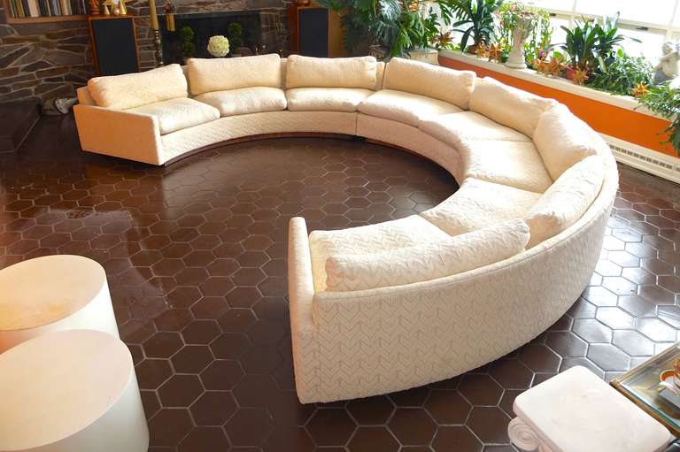 Does it get anymore 70's glam than this three pieces circular sectional sofa by Milo Baughman for Thayer Coggin.  First designed in the late 1960's this one was made in 1973 and has the uncommon rosewood platform base as opposed to feet and was a