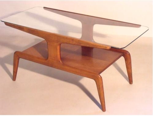 Stunningly stylish Italian two-tier coffee table produced by Domus Nova for the store 'la Rinascente' by Gio Ponti.   Made of light mahogany.  Top is 1/8