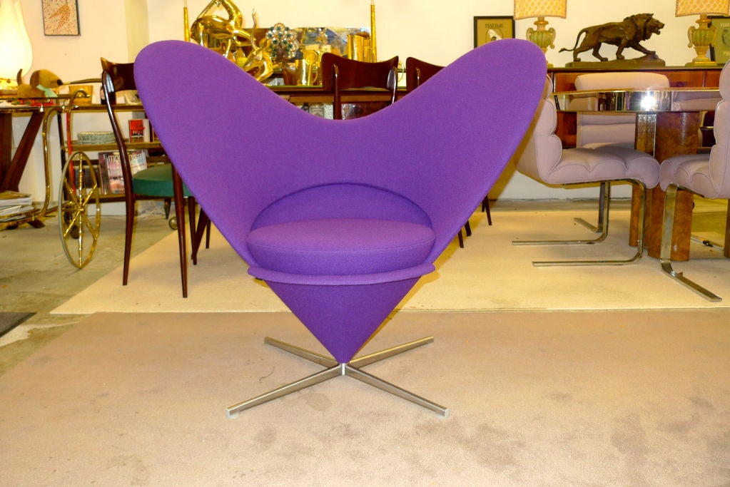 In the mid-1950's, Verner Panton converted a Volkswagen bus into a mobile studio and traveled across Europe. In 1958 he returned to Denmark full of unconventional ideas... one of which evolved into the iconic Heart Cone Chair. Defying gravity, the