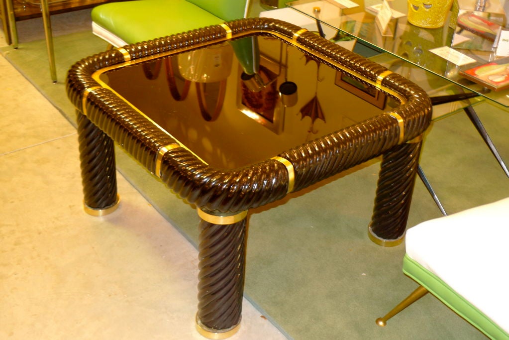 Square coffee table by Tommaso Barbi. Porcelain clad steel frame, black glass and brass embellishments.

I absolutely love this chapter of Italian design which brought us Pierre Cardin and Romeo Rega, to name just a few important luminaries.