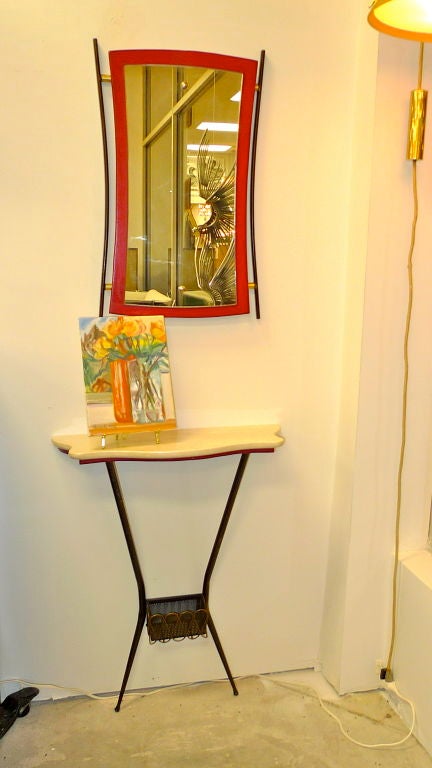 SATURDAY SALE

Slim and narrow console table and mirror with tapering tailored silhouette. (Sorry about the crooked looking photos; my floor is uneven; not the table!)<br />
<br />
The table dimensions are 25" wide, 10" at the deepest