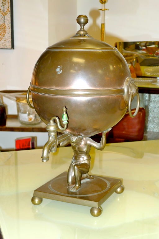 Brass & copper Regency style samovar urn with figure of Atlas holding the globe, on square platform with four ball feet.<br />
<br />
See BG separate listing on 1stdibs (ref: U11120788661353) for substantially the identical atlas samovar which has