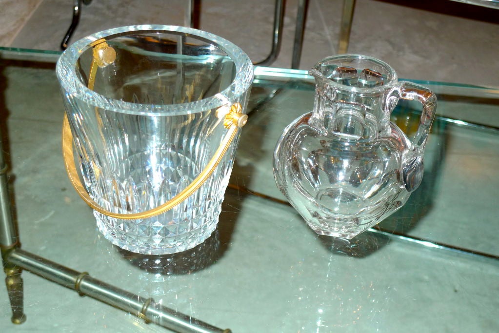 Elegant Baccarat crystal ice bucket / wine chiller with gold dore handle; also a Baccarat crystal water pitcher.  Both marked 