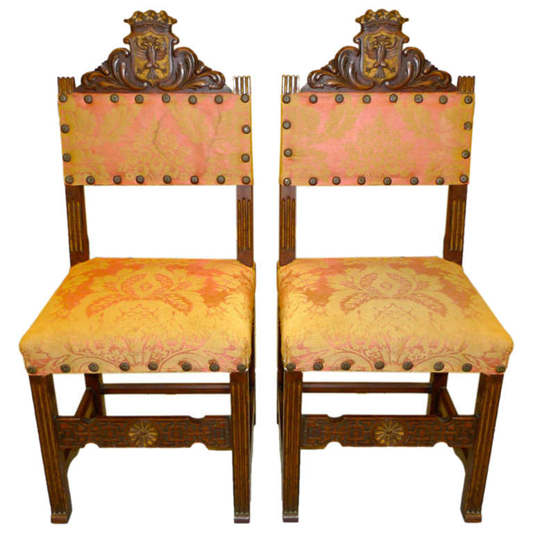 Pair of Carved Spanish Hall Chairs in Original Vintage Fortuny For Sale