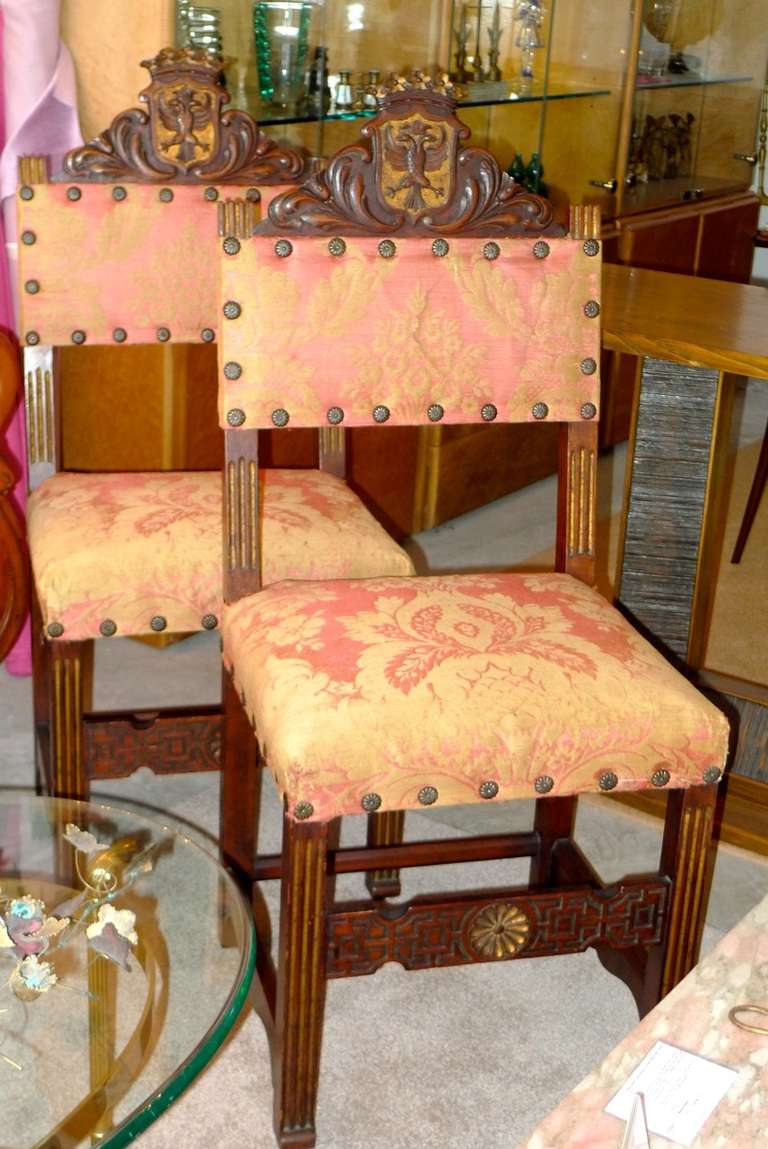 Pair of Antique Carved Spanish Hall Chairs in Original Vintage Fortuny In Fair Condition In Hanover, MA