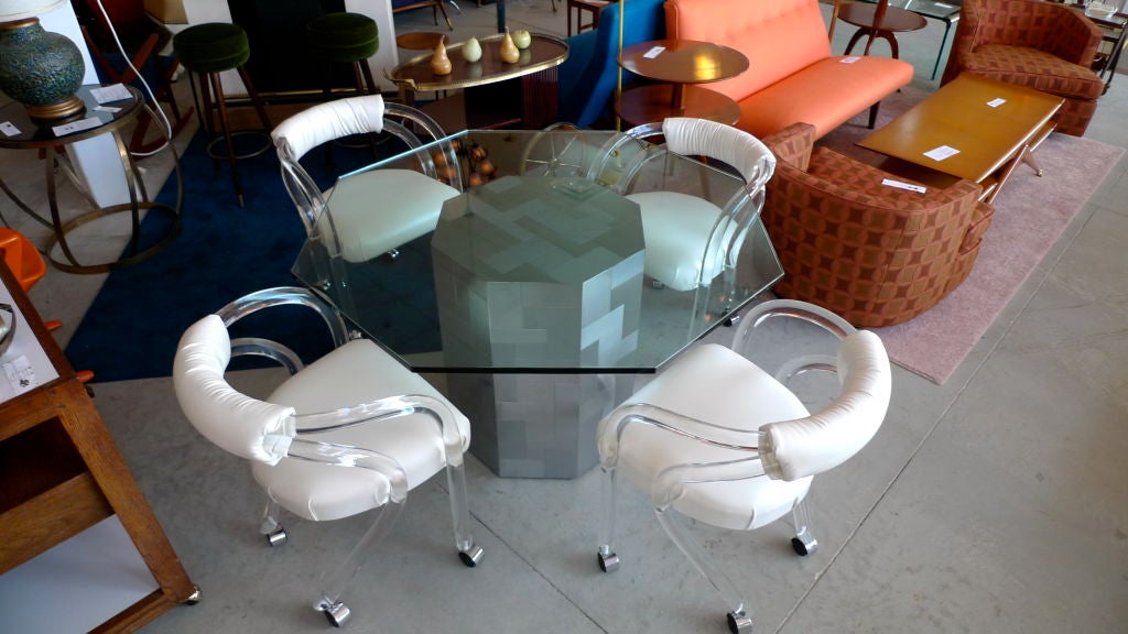 Set of 4 Lucite Chairs on Casters 1