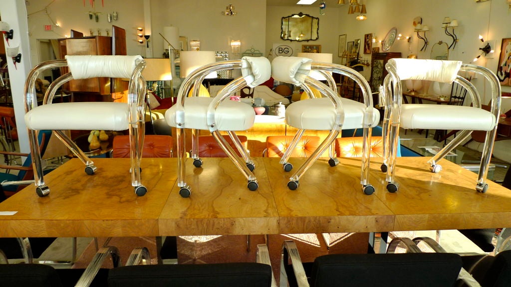 Rolling Lucite Chairs Set of Four 1