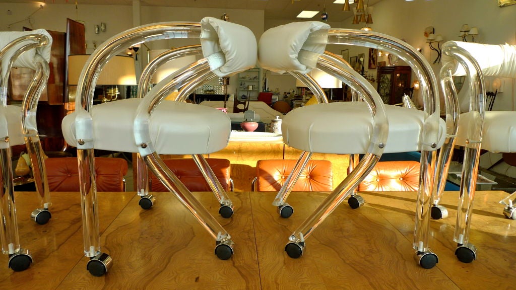 Rolling Lucite Chairs Set of Four 2