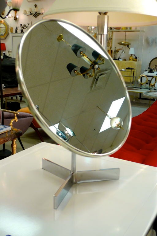 Owen Thomas designed a series of extra large vanity table top mirrors for Durlston Designs of Surrey, England during the 1950's and 1960's and they are sought after as much for their stylish design as for their high quality.<br />
<br />
This