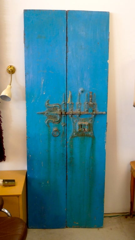 Extraordinary lapis blue painted doors from India with elaborate 