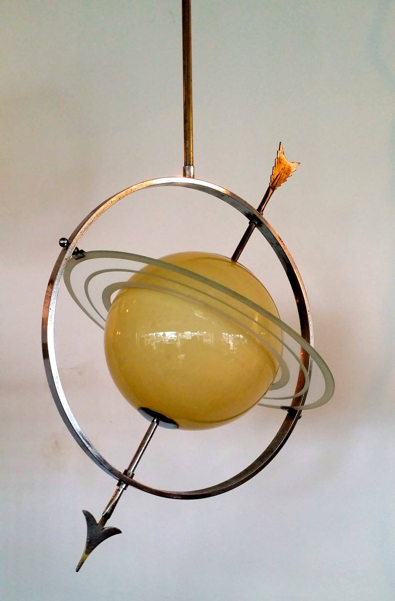 Vintage 1930's Italian Art Deco pendant light in the form of the planet Saturn after a similar lamp designed by Gio Ponti and Pietro Chiesa for S. A. Luigi Fontana & Co. Italy, 1933, in the Mitchell Wolfson Jr. Collection at Florida International