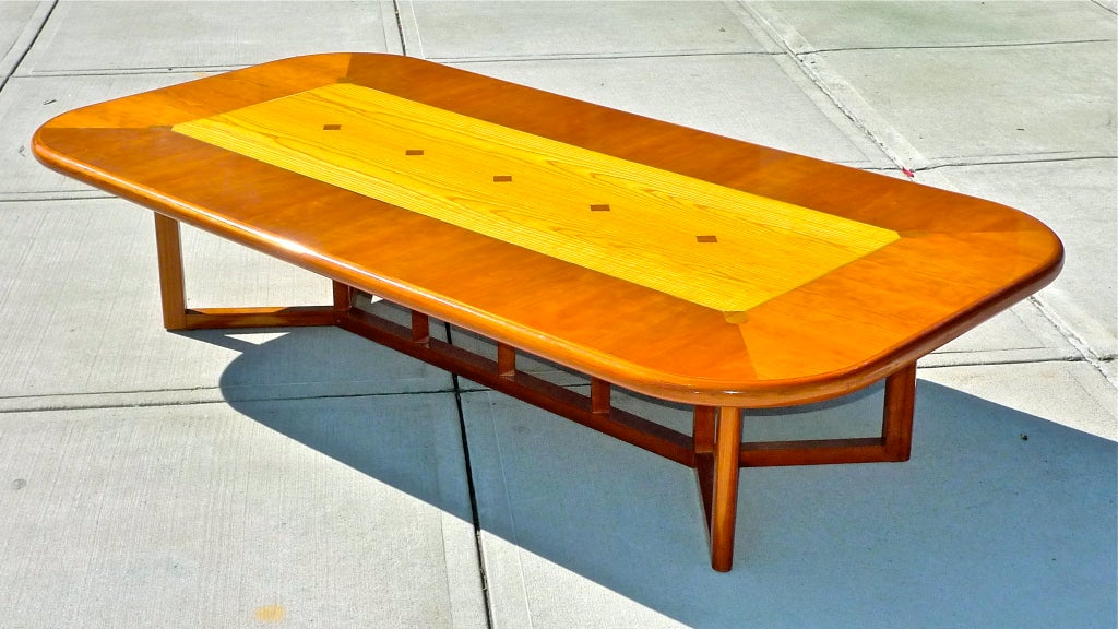 Meticulously detailed geometries of contrasting inlaid woods and brass, generously proportioned (to say the least!) coffee table from the De Menil series designed by architects Charles Gwathemy and Robert Siegel.