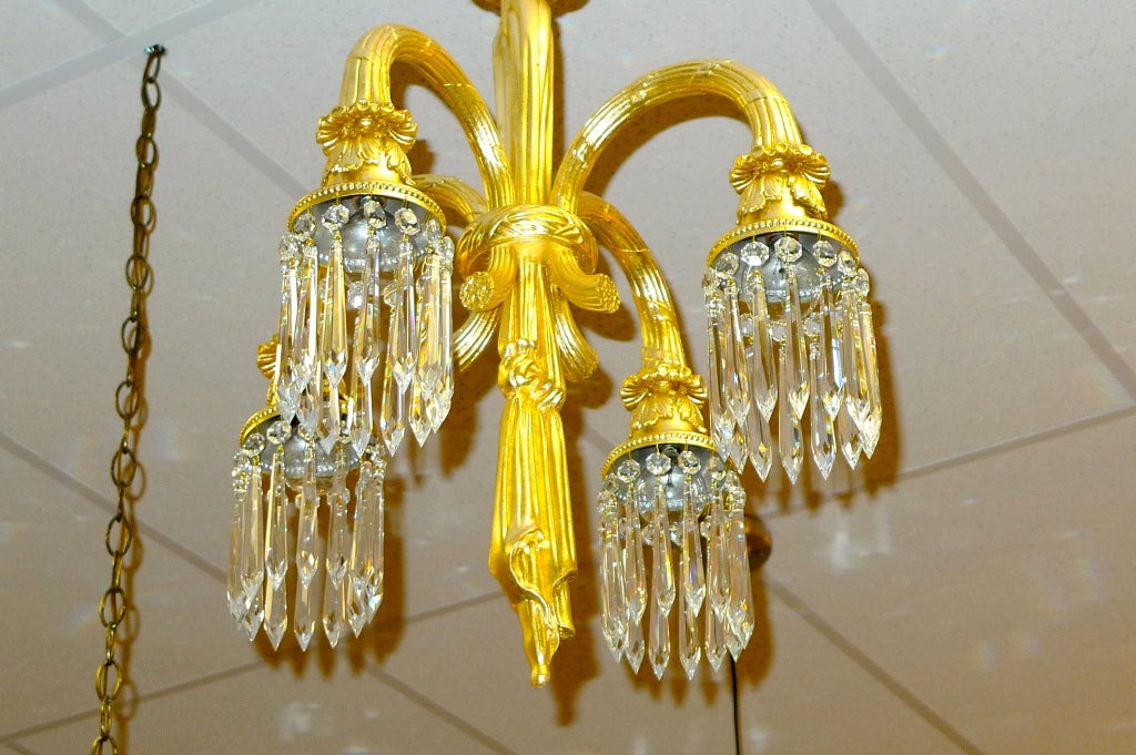 French Four Arm Gilt Bronze & Crystal Chandelier For Sale