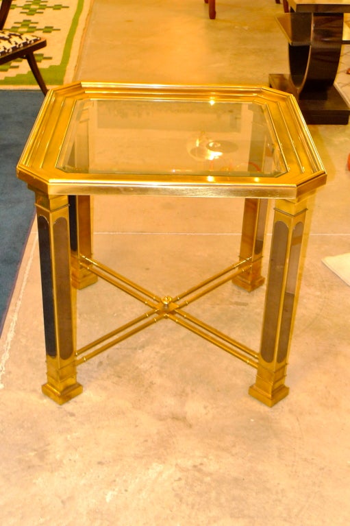 Glamorous square side or lamp table with double bamboo x-base stretchers, gunmetal embellishments on legs, stepped picture-frame top and beveled glass.