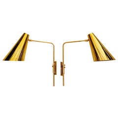 Pair of Adjustable Wall Sconces after Paavo Tynell