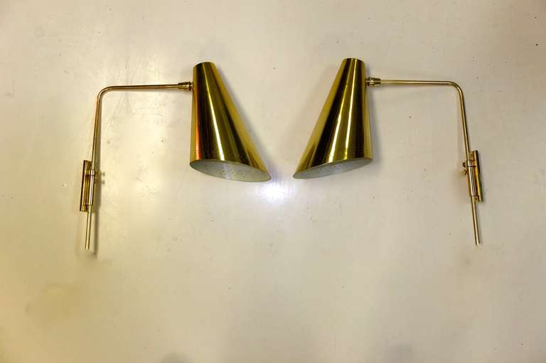 Mid-Century Modern Pair of Adjustable Wall Sconces after Paavo Tynell