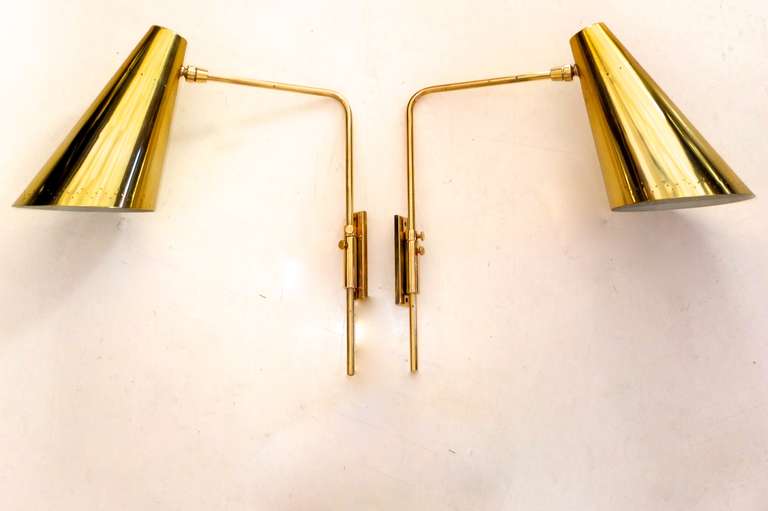American Pair of Adjustable Wall Sconces after Paavo Tynell