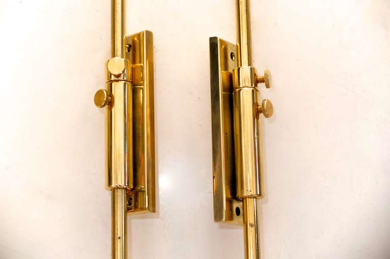 Pair of Adjustable Wall Sconces after Paavo Tynell 1