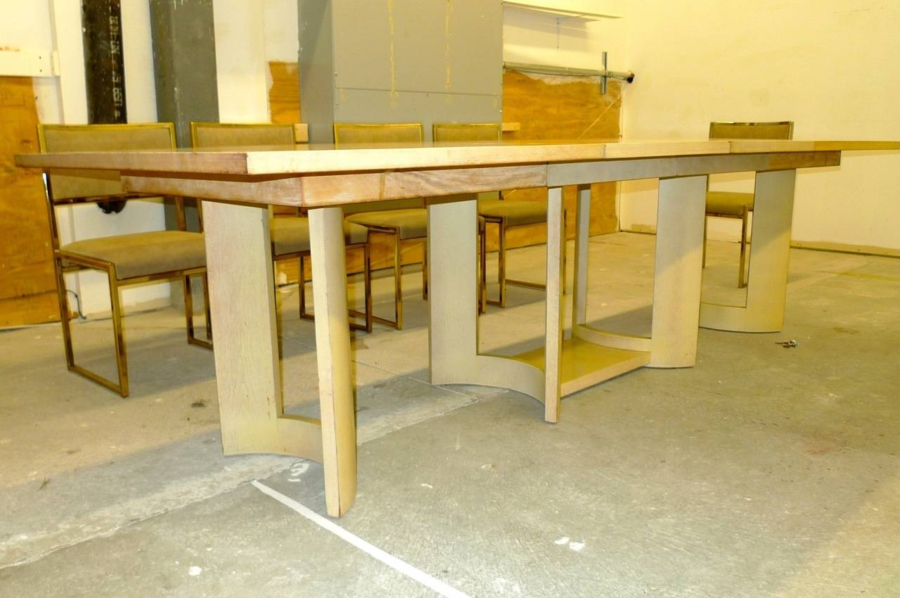 Glamorous American modern early 1940's dining table by Virginia Conner for Grosfeld House, 1939/1940.  Shown here in original blonde finish, unrestored.  Fully extended table is 100 inches with two 22 inch leaves.  Closed is 66 inches.  Width 42