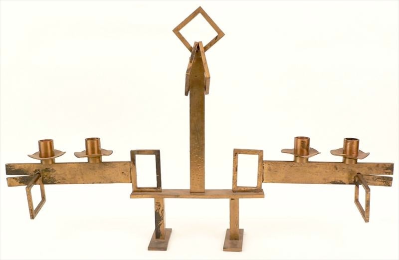 Studio produced vintage 1960's modernist candelabrum with two plank feet below the wide body with four candle holders and centered by a tall shaft that terminates in an open square. Decorated with four hanging square 