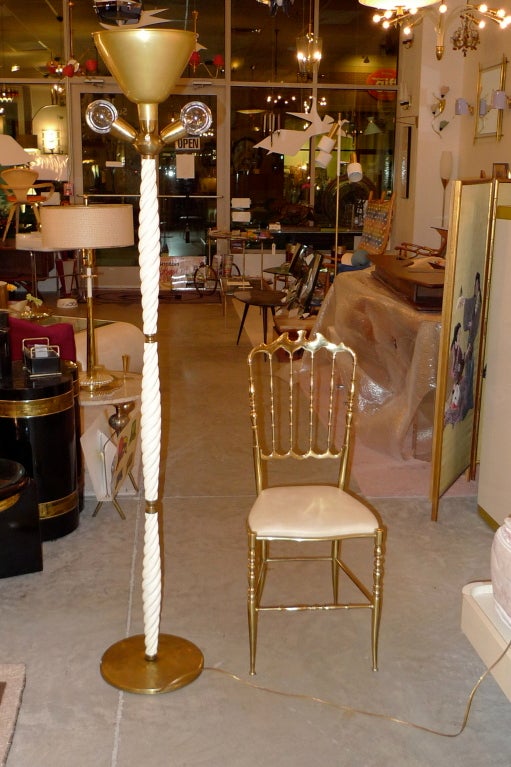 1950's Italian floor lamp with brass base and white enameled wood spiral turned shaft.