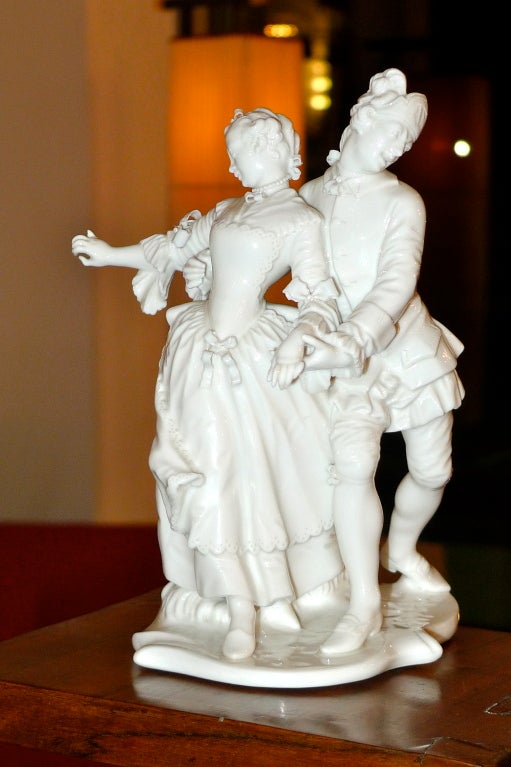 Franze Anton Bustelli, one of the most important porcelain modellers of the Rococo, in 1754 for PORZELLAN MANUFAKTUR NYMPHENBURG. Porcelain, glazed, sculpted representation of Consortin, the messenger-goer, his right hand on the waist of the lady,