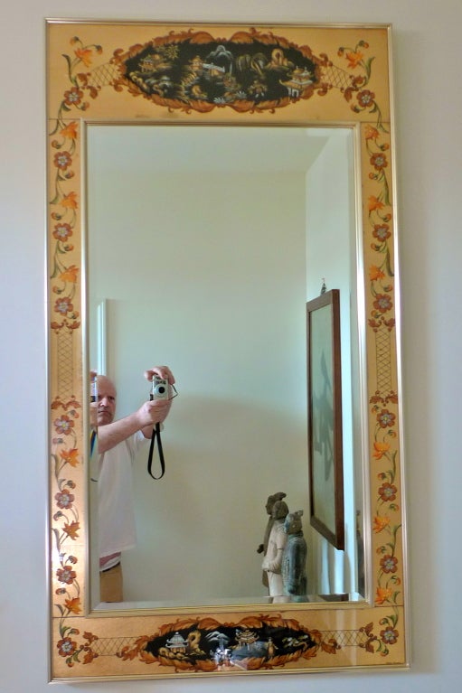 Beautiful brass framed chinoiserie reverse painted rectangular wall mirror with beveled glass, signed by Elinor Burns