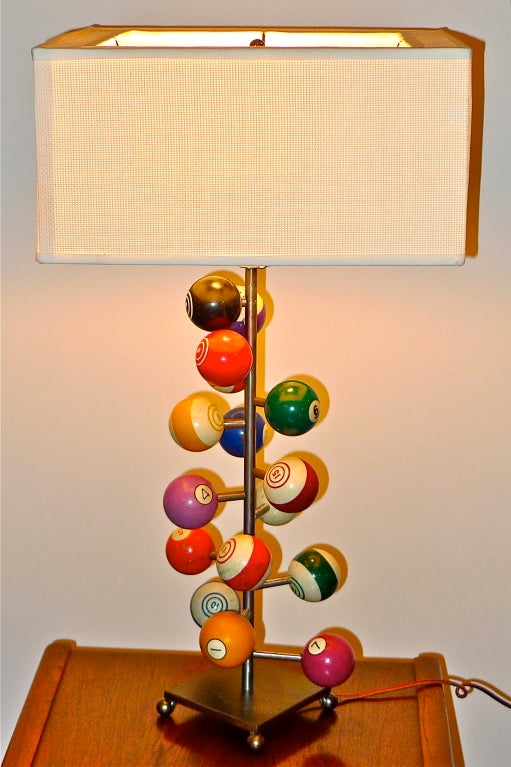 Rack 'em up!  Vintage 1950's set of billiard balls which have been drilled and mounted to a lacquered steel base. Recent one-of-a-kind custom production.