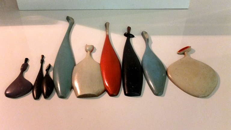 American Metal Wall Plaques of Stylized Wine Bottles By Sexton For Sale