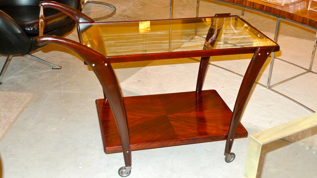 Gorgeous Italian mahogany bar cart in the manner of Cesare Lacca.