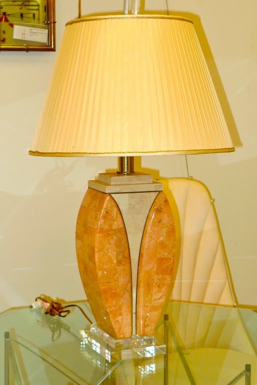 A 1970's tessellated stone and brass table lamp on stepped lucite base attributed to Karl Springer, possibly produced by Maitland Smith.

See companion lamp in image number 10.