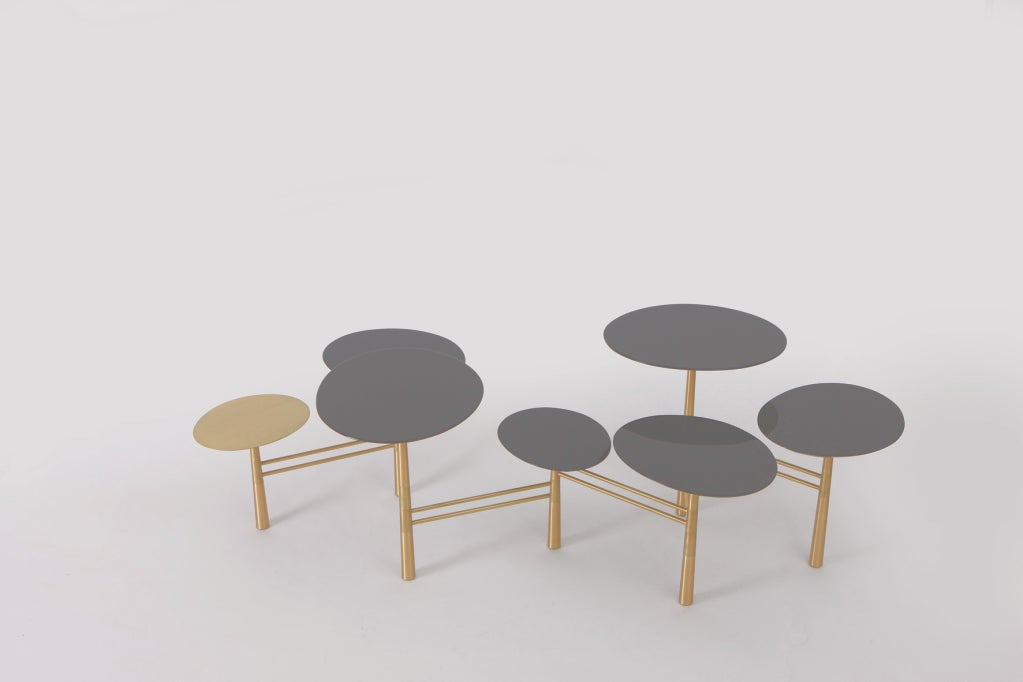 Iraqi born, RISD trained and Beirut based artist/designer, Nada Debs has created what I believe is the first design icon of the 21st century.

The configuration of this stunning multi-tiered cocktail table is infinitely flexible and a joy to play