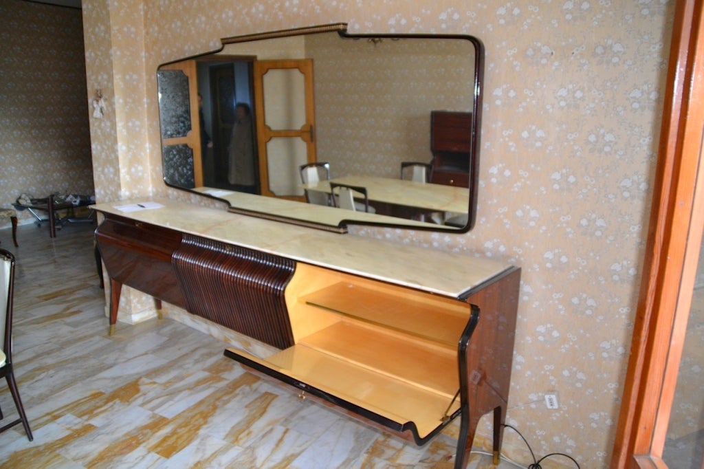 Osvaldo Borsani sideboard / buffet with large detachable mirror and cream marble top.  Absolute knock-out good looks. This sideboard / server is part of an entire dining room ensemble we acquired from the original owners in Italy who purchased it in