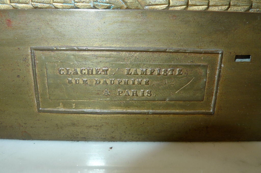 Paire de lampes de table à colonne en bronze signées 