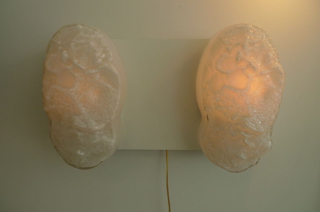 Pair of white glass Italian sconces by Vistosi.
