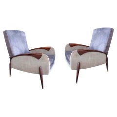 Pair of lounge chairs by Guiseppe Scapinelli