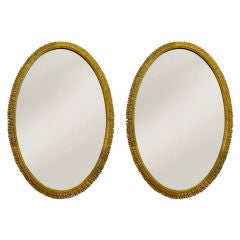 Pair of 1930's oval Gilt Wood Sunburst Mirrors