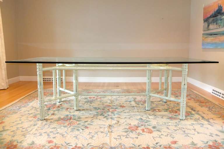 SATURDAY SALE


Vintage 1970's rectangular dining table designed by John McGuire in its original gloss white lacquer finished bamboo with chrome caps for a 96" x 42" glass top, 3/4" thick with 1" bevel.

The base features six