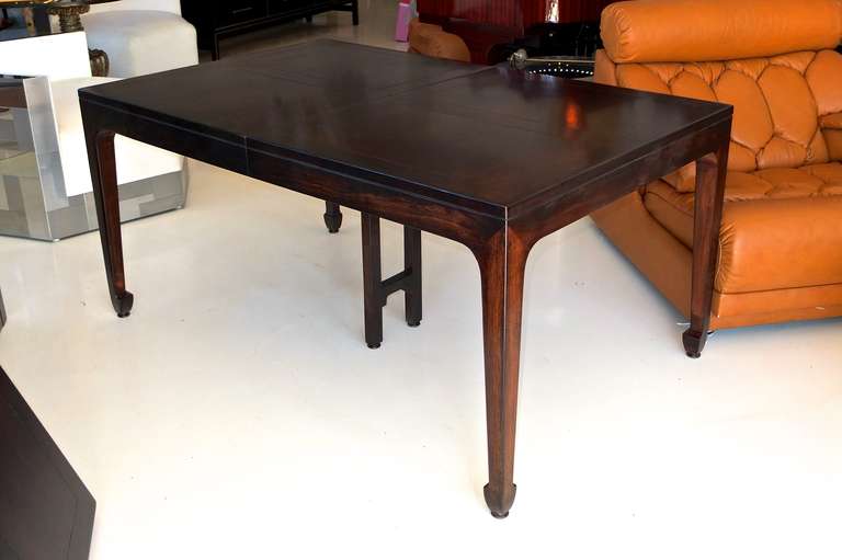 Figured walnut parquetry dining table by Baker Furniture 