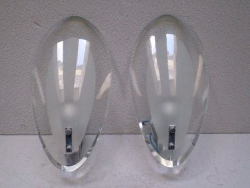 Two pairs of oblong shaped convex glass with frosted centers and polished chrome fittings and mounts. <br />
Please note that I have them mounted on board covered in suede for my store display.  On one pair the glass is clear; the other is smoked.
