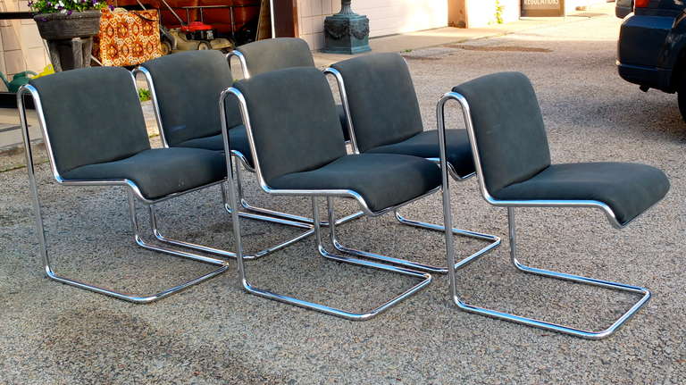 Set of six reverse cantilevered dining chairs by Thonet Industries (label under each chair) circa 1970. Chromed tubular steel Bauhaus design.  

Original upholstery in matte charcoal canvas (similar to a car's convertible roof material).  This