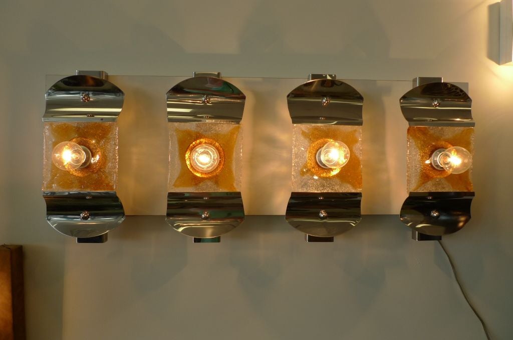 Murano glass squares by Mazzega house in curved chrome frame with single bulb in center, provides striking illumination