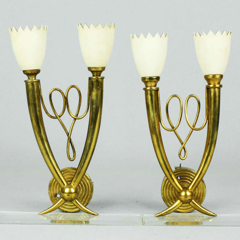 These gorgeous sconces really capture the essence of the early Novecento and evoke the designs of Pietro Chiesa and Gio Ponti.  Crafted largely by hand in a small artisans studio.

Recommend mini globe candelabra size bulb. Height 11 inches