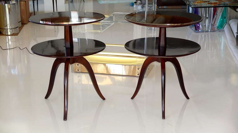 One of these tables is from the Edward Wormley collection for Dunbar, the other is from the Paul Frankl collection for Brown Saltman.  Both are mahogany and are nearly identical.   The only difference is that the Dunbar table has a two inch band of