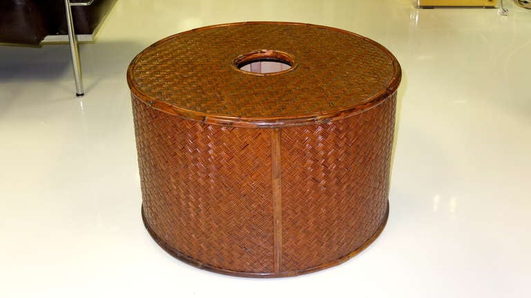 SATURDAY SALE

Braided rattan cylindrical form cocktail table made in Italy by Gabriella Crespi from the House of the Rising Sun collection, c. 1973

Originally this would have had a larger rattan top with a lazy susan tray which are now lost to