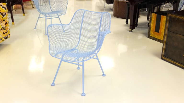 Great pair of iron and woven iron mesh arm chairs.  Originally white, we have recently prepared and painted them in a custom baby blue oil-based gloss Rustoleum.

See our separate listings for the companion Woodard Sculptura bouncer rocking chair,